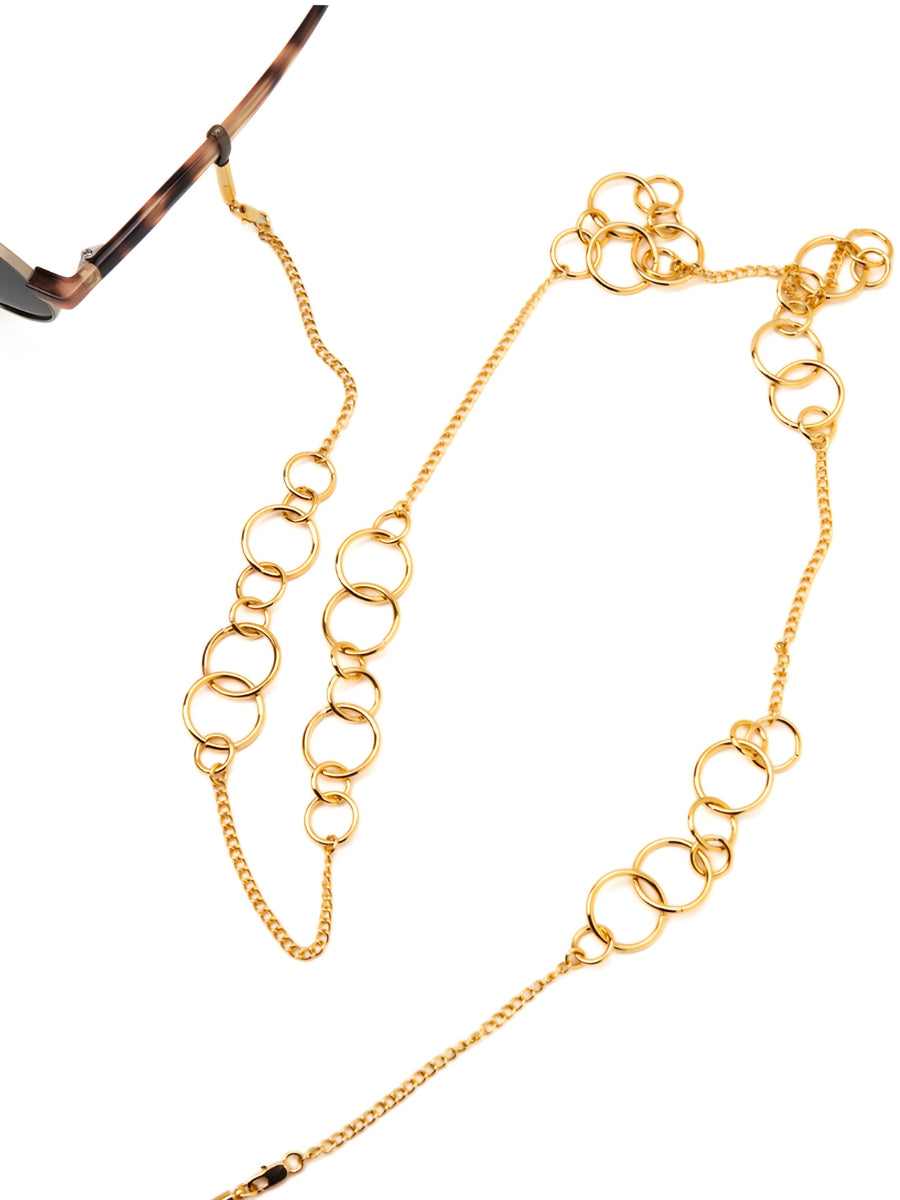 Gold eyewear chain with round details in varying sizes