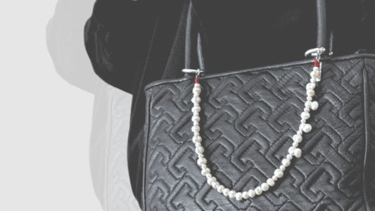 Bag accessories elevating everyday style on a black handbag – SPECSET