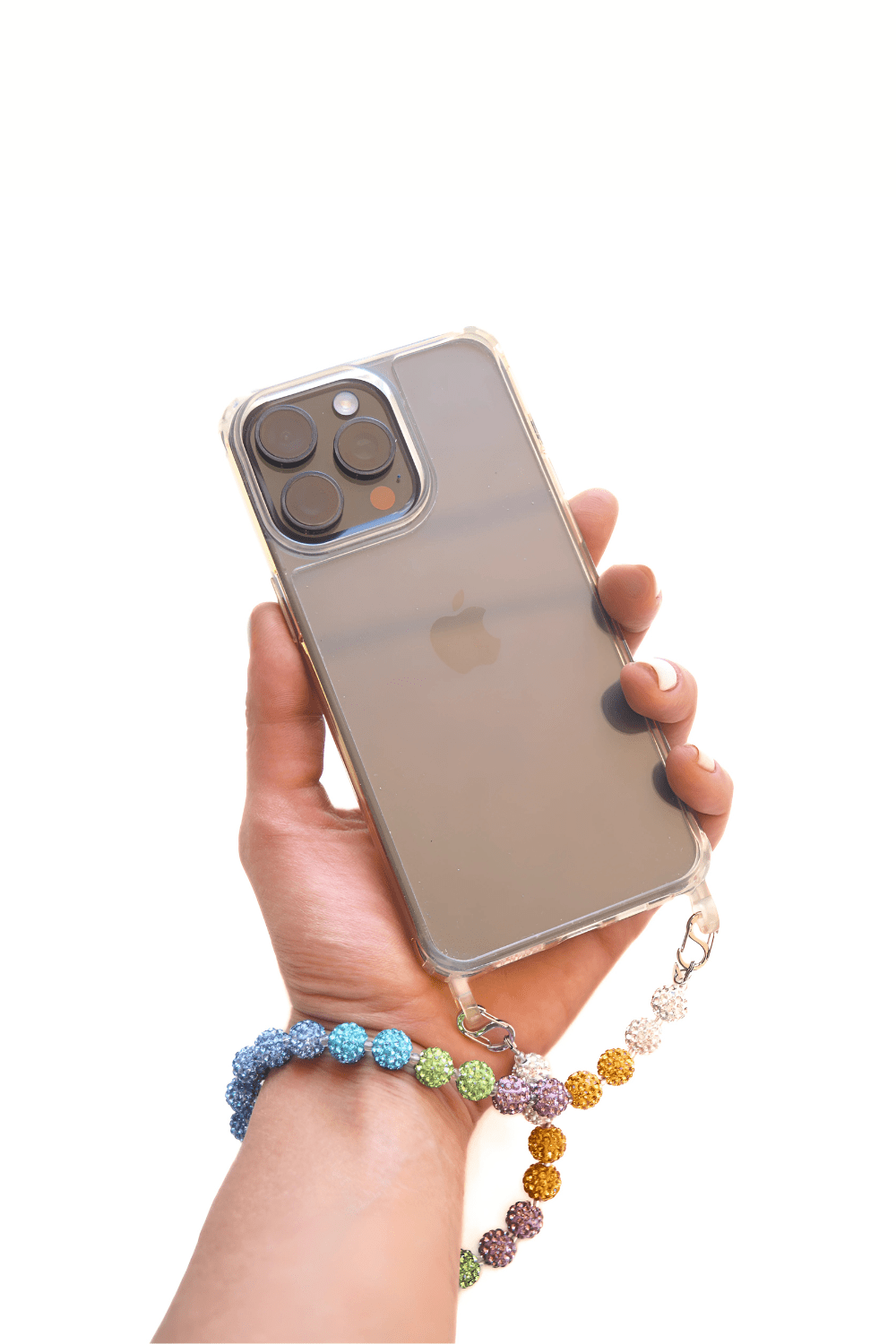 Hand holding a phone with a clear case, attached to a multicolored beaded wrist strap.
