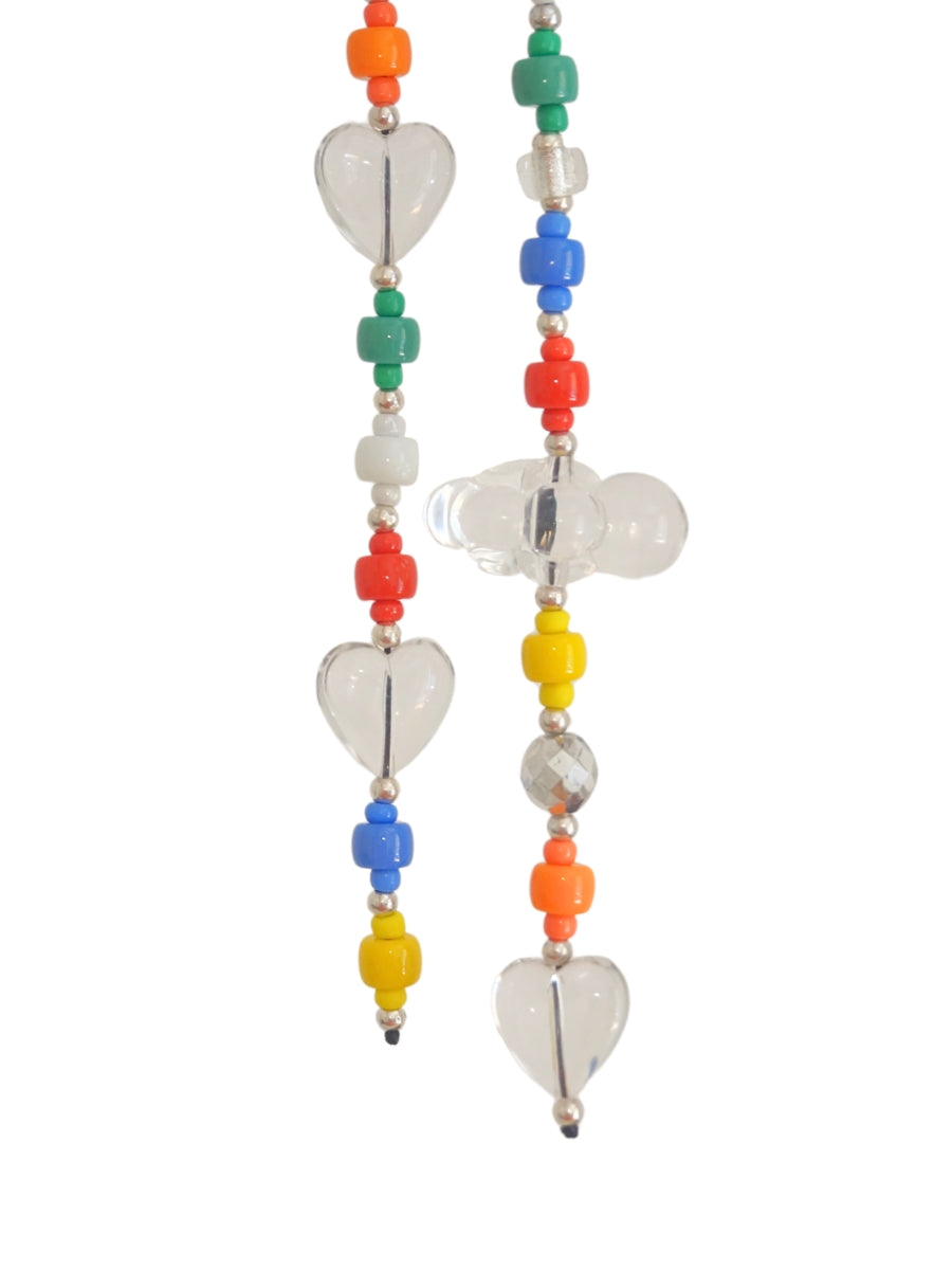 Close-up of a colorful beaded bag charm on a white background. The charm features multicolored beads, clear hearts, and a cloud accent. 