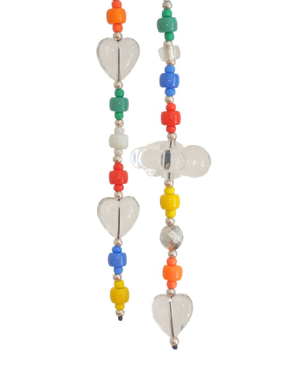 Close-up of a colorful beaded bag charm on a white background. The charm features multicolored beads, clear hearts, and a cloud accent. 