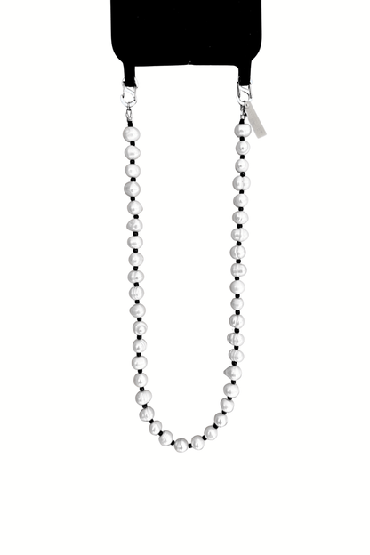 Her Heritage Pearl Phone Strap on white background, showing its length and quality materials.