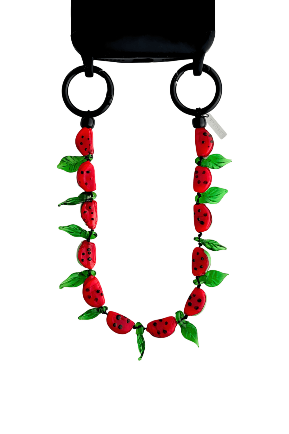 Juicy Crush beaded phone charm styled on a white background.