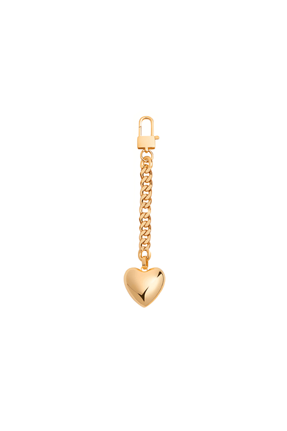 Love Above, gold heart bag charm keychain on white background.