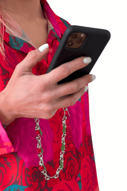 Hand holding Perfect Bloom phone chain