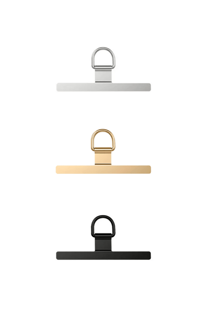 Set of three clips in white, gold, and black on a white background