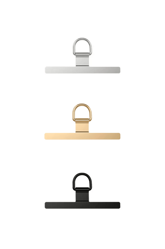 Set of three clips in white, gold, and black on a white background